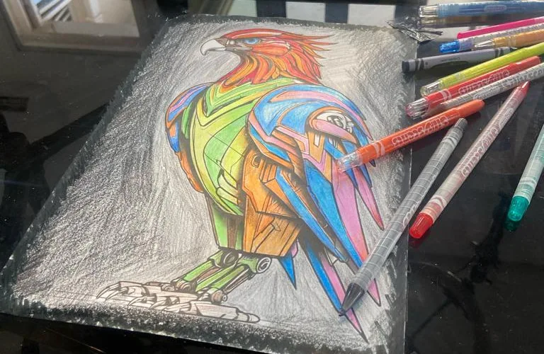 image of Akinwale Arokodare coloring an Eagle
