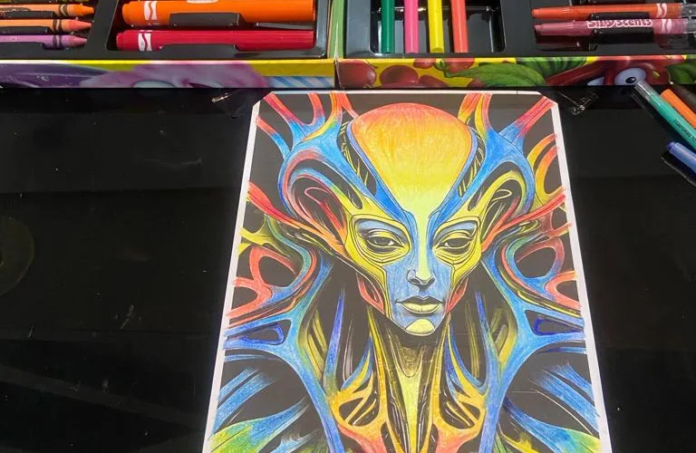 Image of Akinwale Arokodare coloring an AI generated creature Image